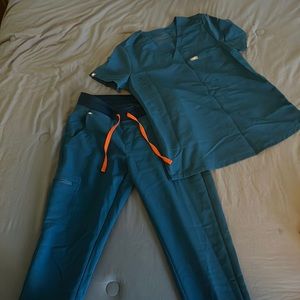 FIGS scrubs set. Dark turquoise blue color. Great condition. Like New.